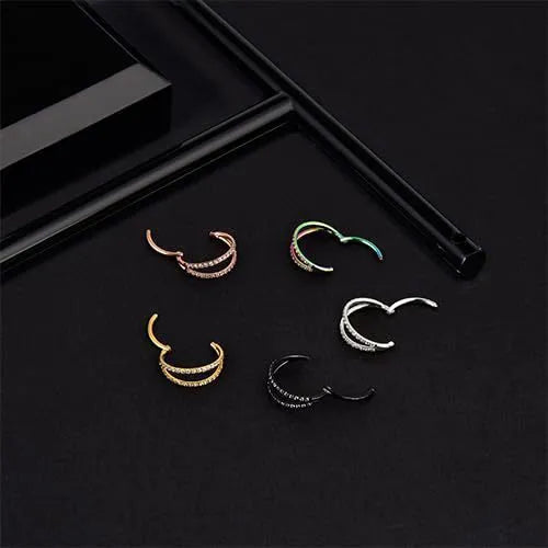G23 titanium alloy lip and nose ring body jewellery with a zircon stud in gold or steel colour.
