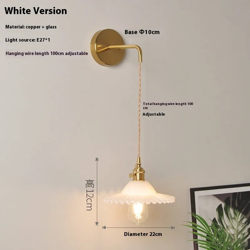 Brass lotus wall lamp with glass shade in six colour options