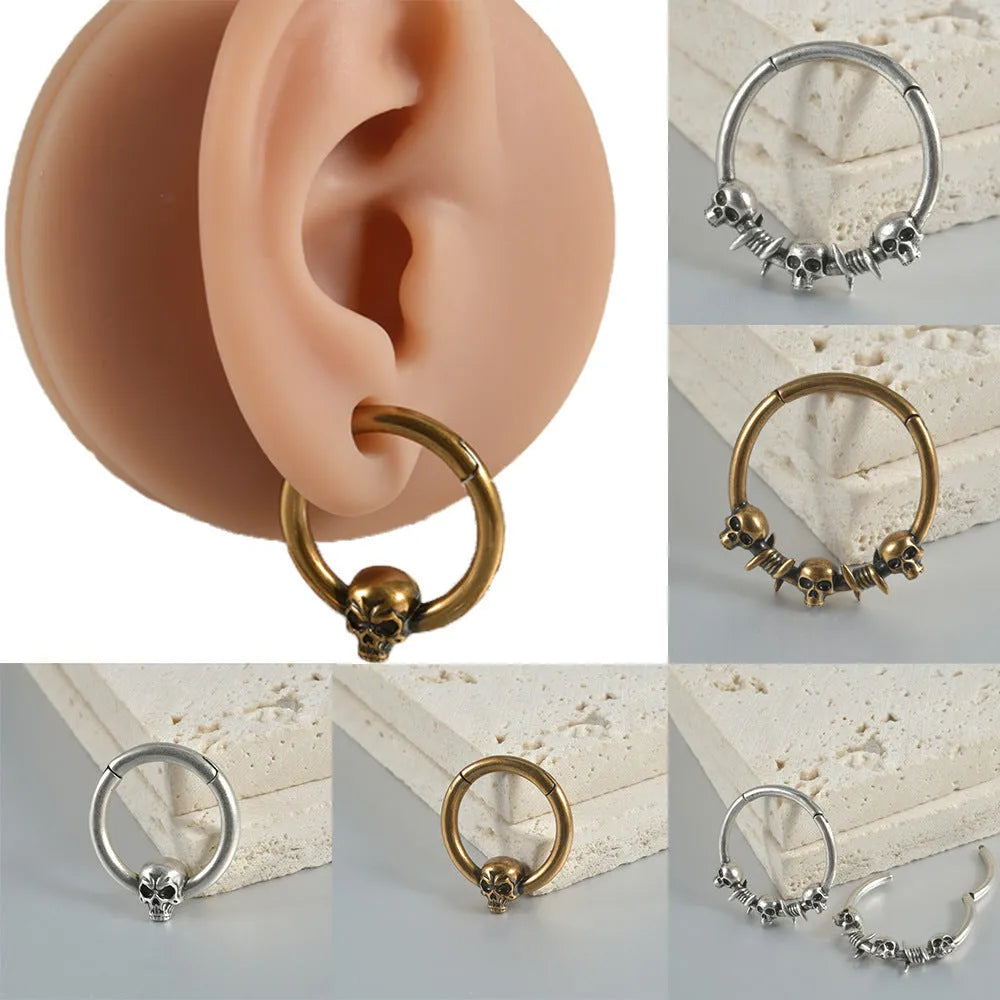 Copper punk earrings with vintage ghost head design in antique gold finish