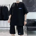 Waffle leisure sports suit consisting of short sleeve top and matching shorts in polyester cotton fabric