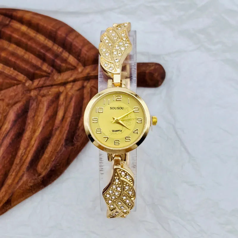 Women's stainless steel watch with round dial on a metal strap with Vachette clasp.