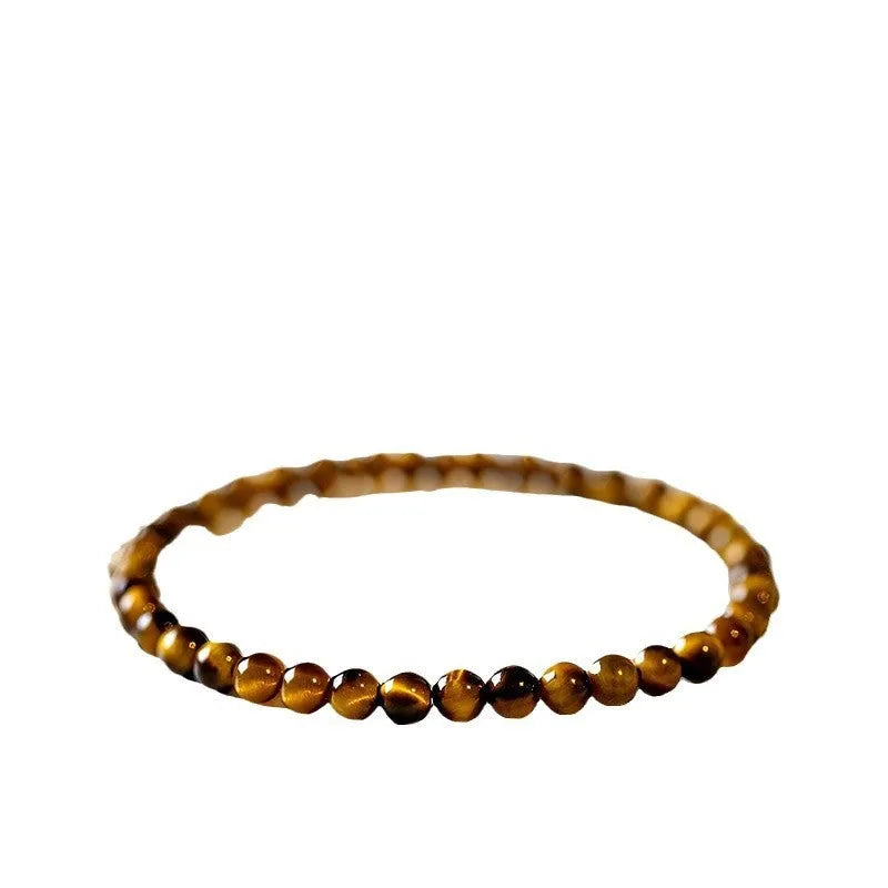 Tigereye stone bracelet with geometric design in Chinese style, showing bead details