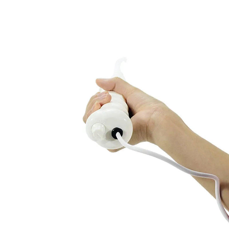 White hand held high frequency electrotherapy comb with glass tube accessories for acne and mite removal in box packaging