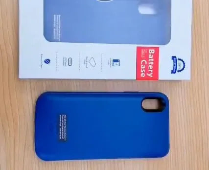Shockproof silicone iPhone battery case in black, blue, pink, or white with integrated charging and extended battery capacity