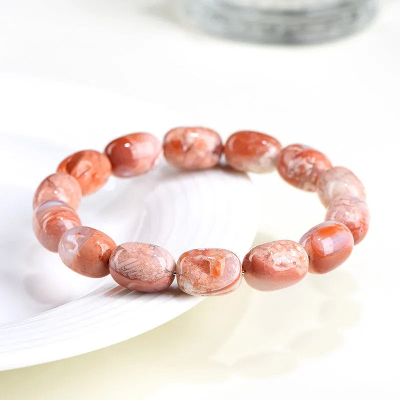 Natural cherry agate barrel bead bracelet with geometric 10x14mm beads and Ruyi charm