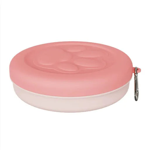 Portable plastic dog feeding bowl in green and pink colour options for outdoor use
