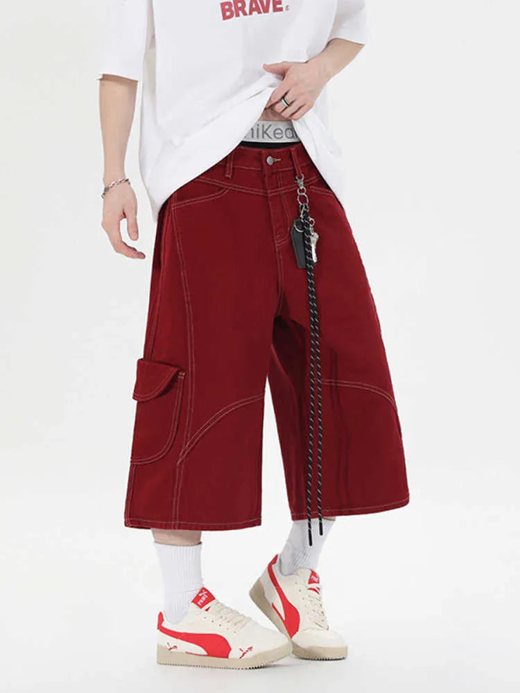 Retro denim workwear shorts with multiple pockets, wide leg cut and cropped trousers length