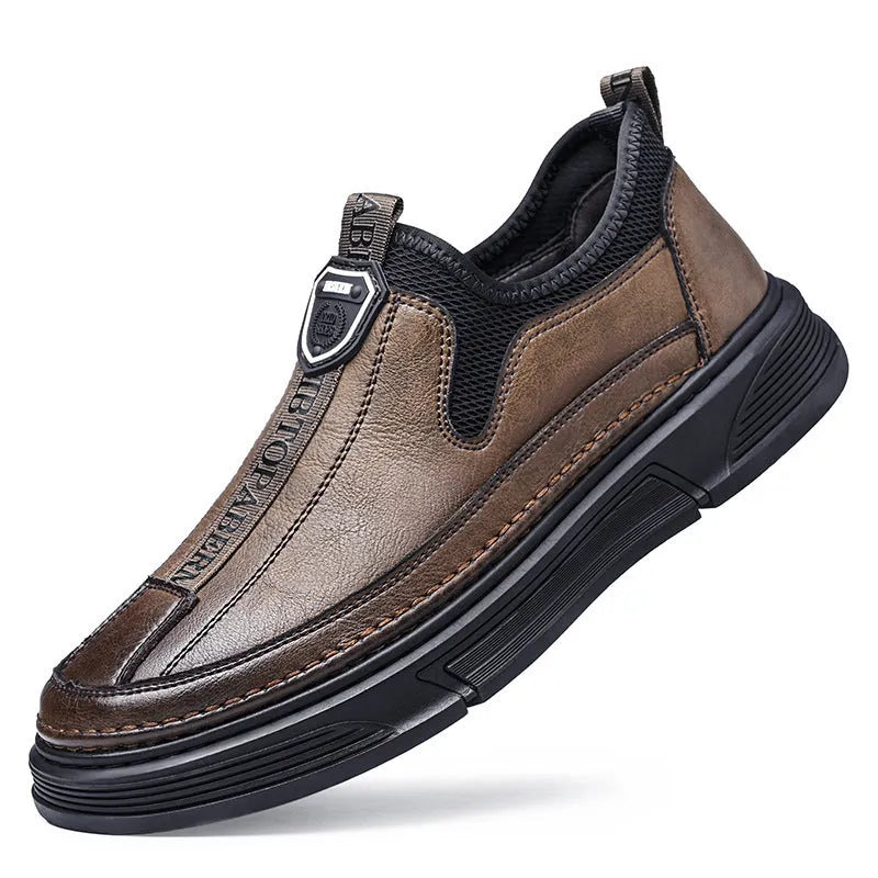Men's black leather casual shoes with a round toe on a white background.