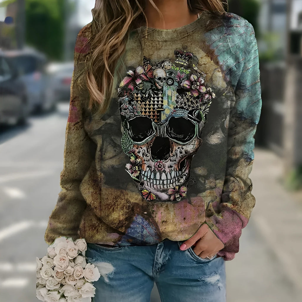 Black long sleeve sweatshirt with a skull print graphic, shown on a model.