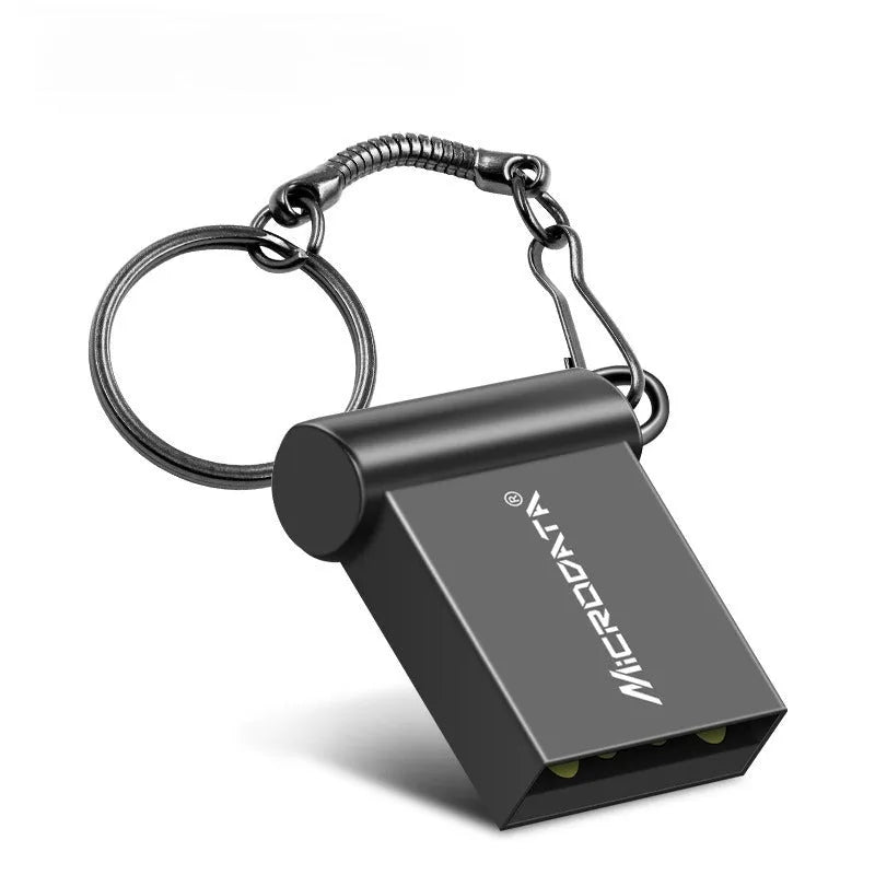Miniature silver car-shaped metal USB flash drive on a necklace chain.