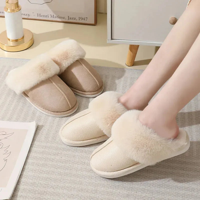 Brown women's plush indoor slippers with round toe, stitching detail, and flat non-slip sole.