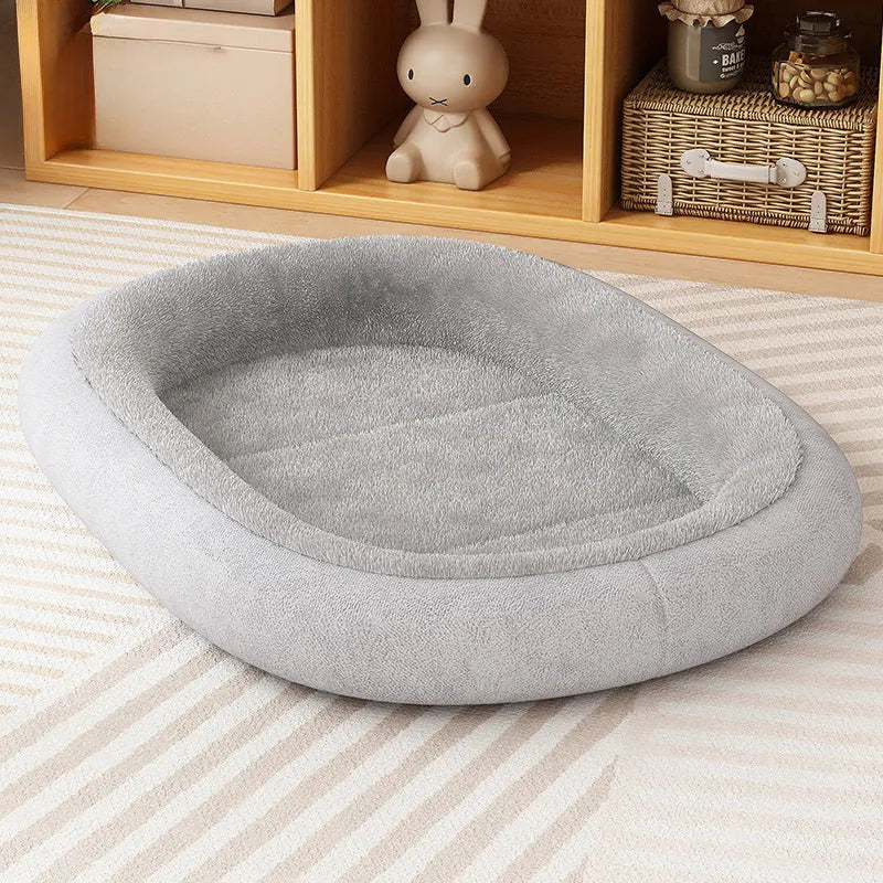 A thick padded dog kennel for small and medium dogs in a grey colour, shown with size dimensions.
