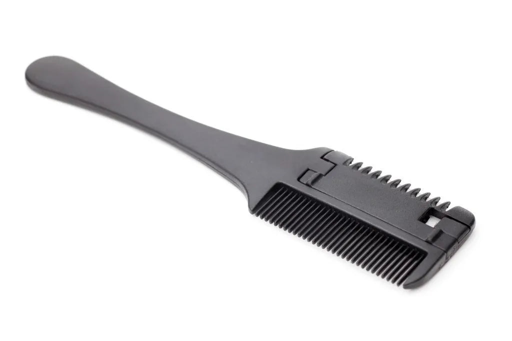 A pet razor comb grooming tool with a plastic handle and metal blade, shown with spare replacement blades.