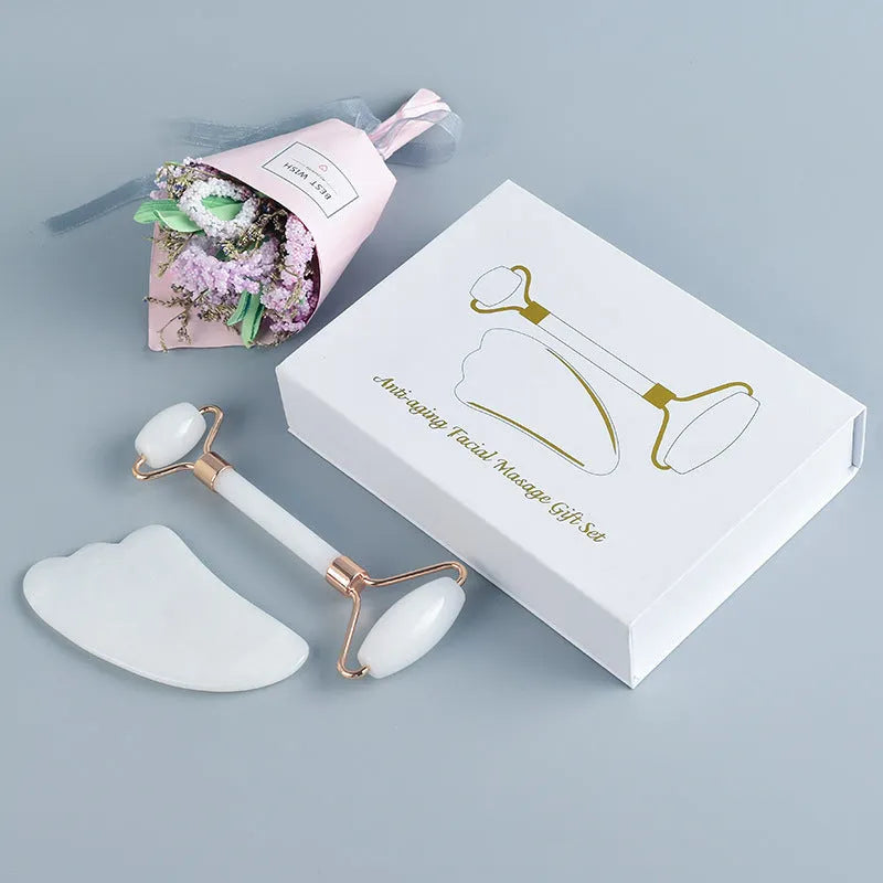 White jade double-headed facial roller and optional wooden gua sha scraping board.