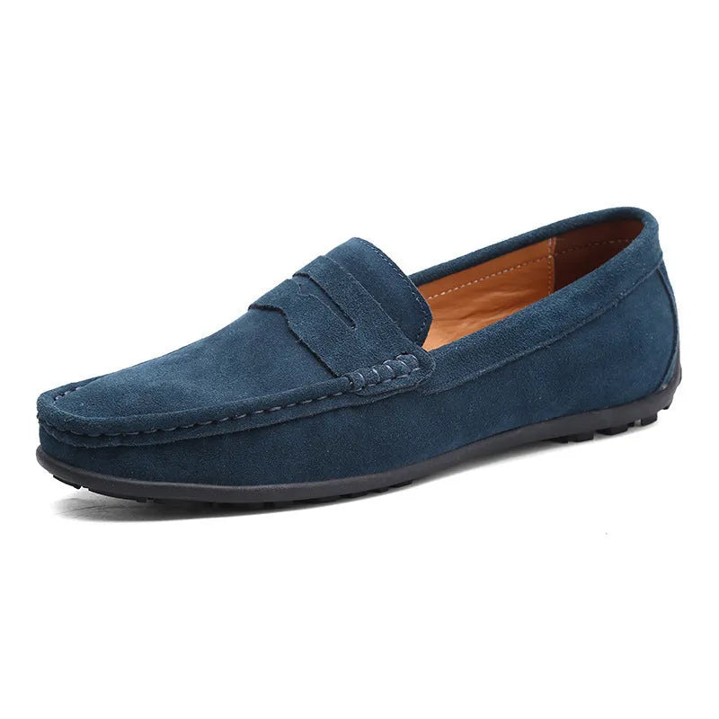 Men's brown suede casual loafers with a round toe and flat rubber sole on a white background.
