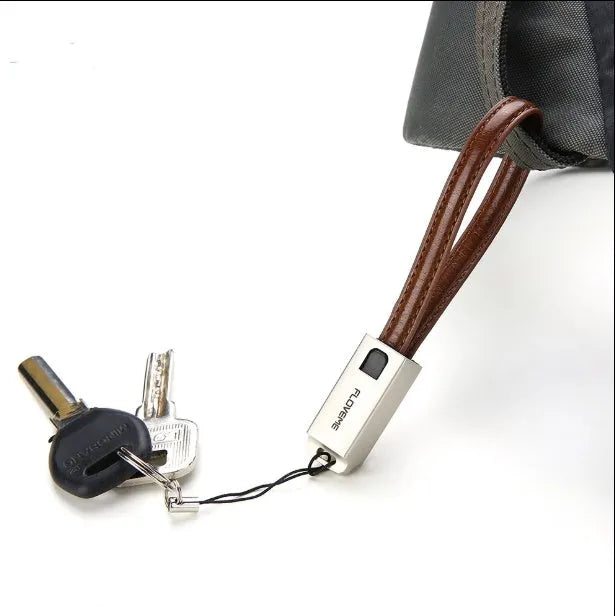 Leather wrapped iPhone charging cable with zinc alloy connector showing 20cm length
