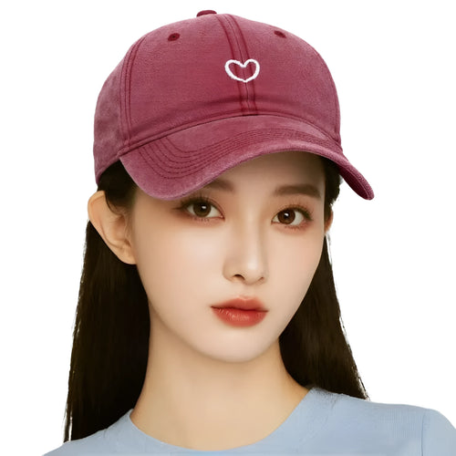 Soft cotton baseball cap with an embroidered red love heart on the front, shown in adjustable size.