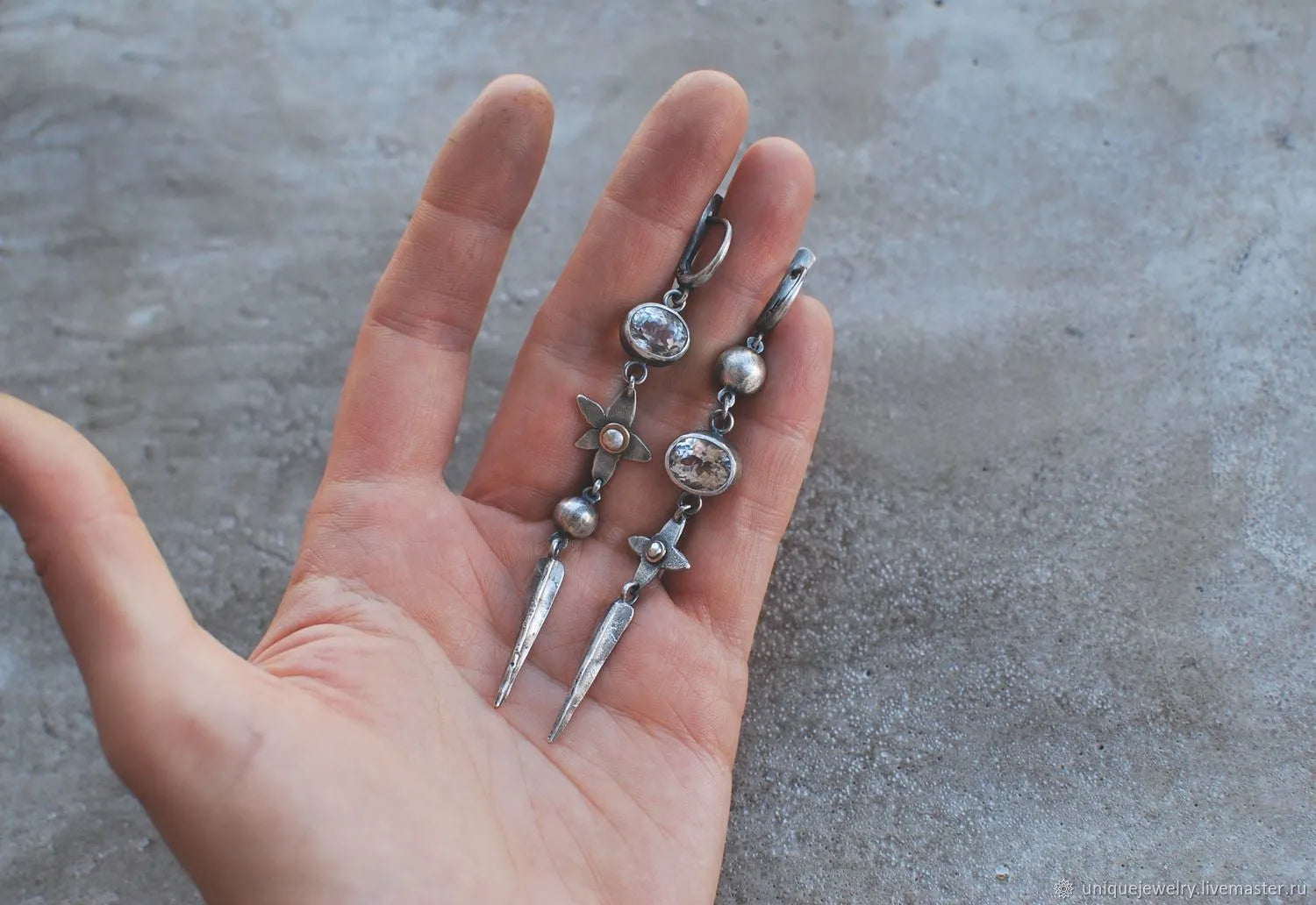 Hesheng geometric long pendant earrings with XINGX design and rhinestones in antique silver.