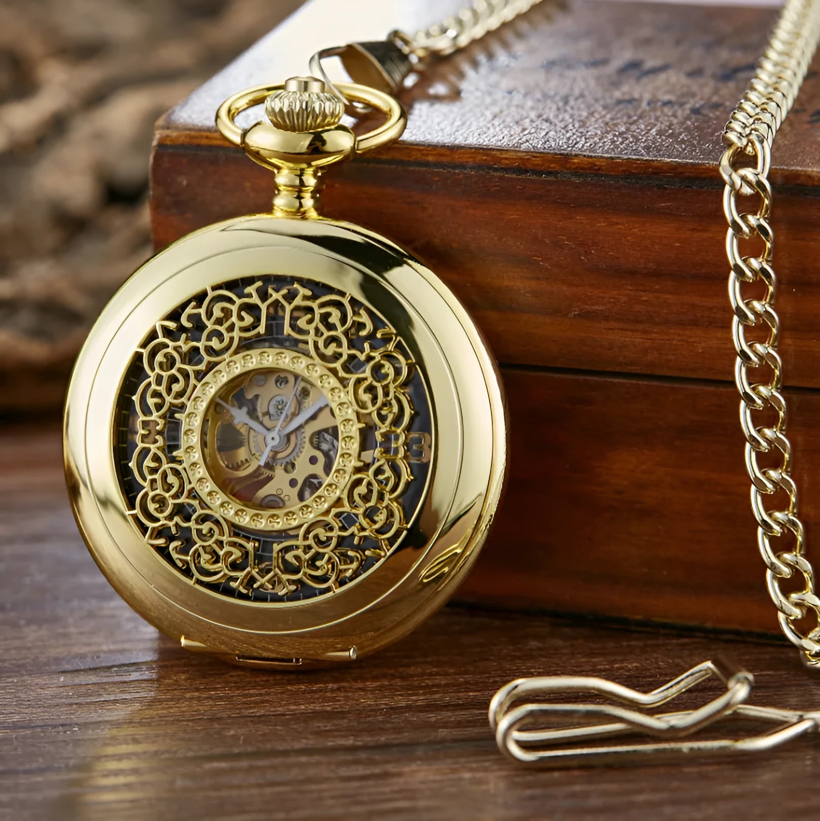 Retro floral print automatic mechanical pocket watch with transparent case back in gold finish.