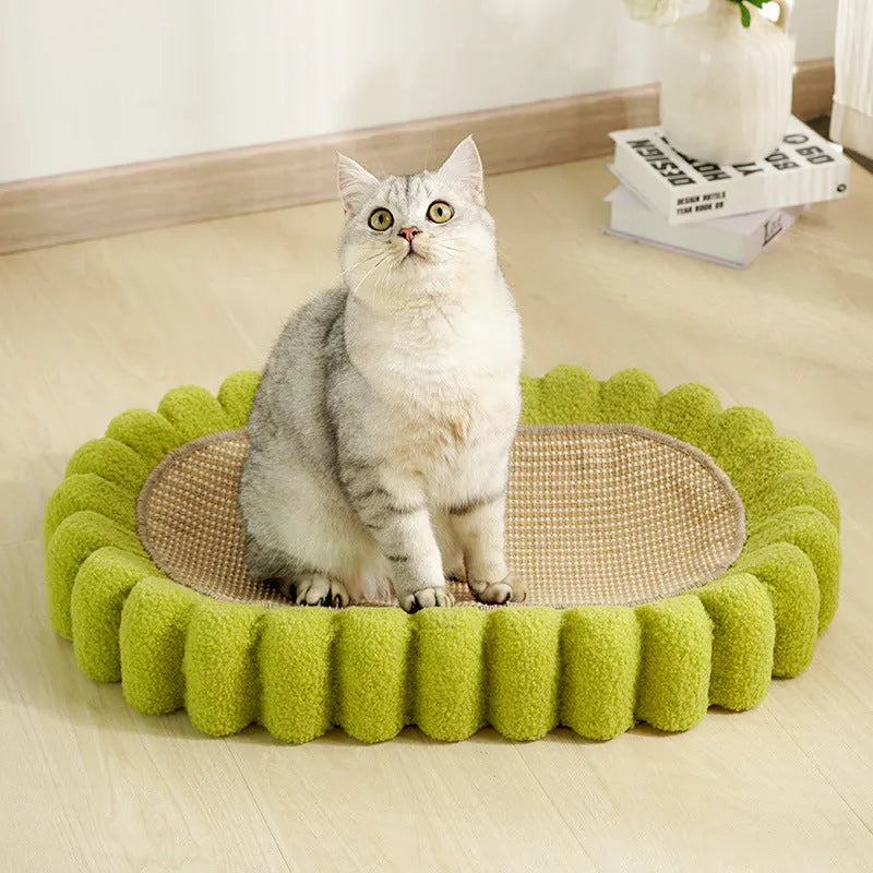 Green oval cat scratch pad and lounge bed made from sisal material