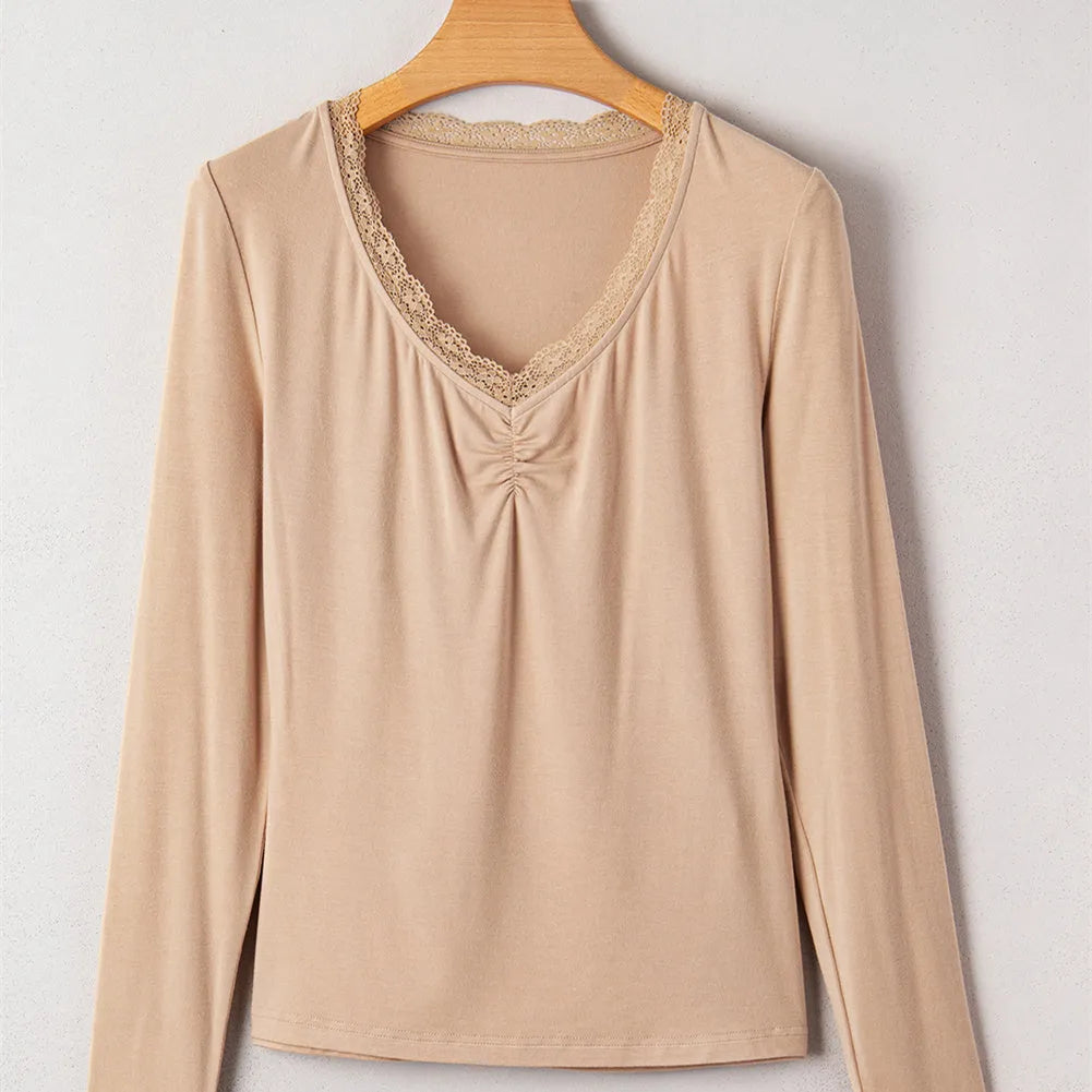 Women's red slim fit long sleeve casual top with delicate lace trim detail on the sleeves.