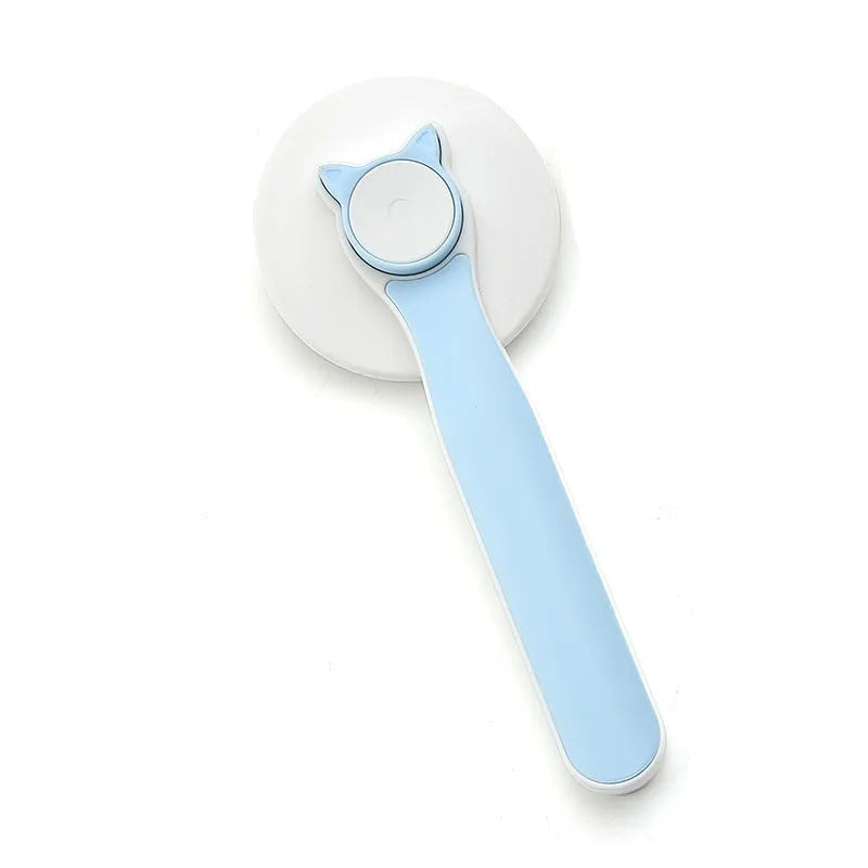 Blue self-cleaning pet grooming brush with rubber handle and stainless steel pins on a white background.