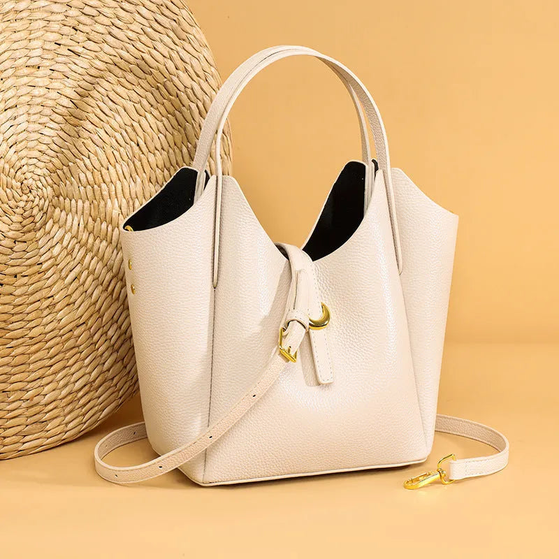 Genuine leather women's large capacity bucket bag in retro style with hand-held design
