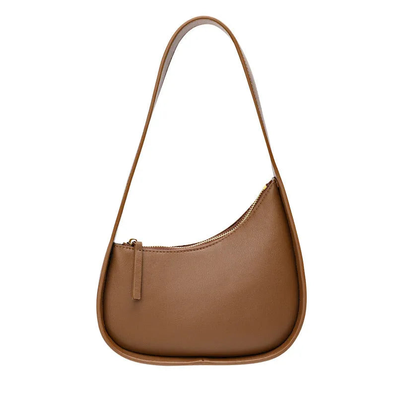 Genuine leather half moon women's handbag with wide shoulder strap in caramel colour