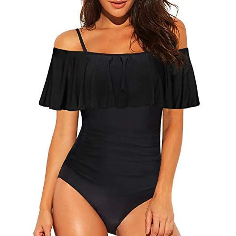 Black one-piece swimsuit with ruffled tube top straps and side cut-out details