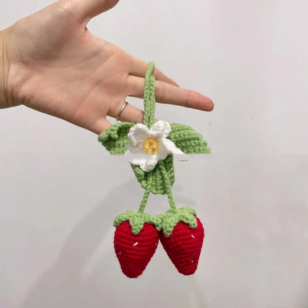 Handmade strawberry-shaped car pendant woven from cotton and hemp using knitting wool techniques