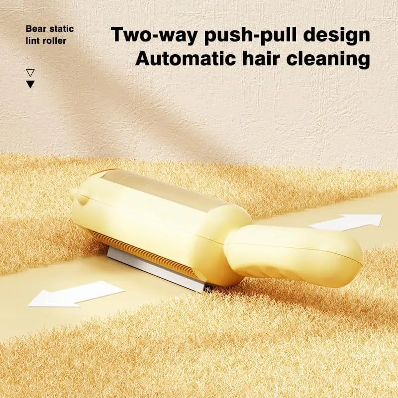 Blue reusable pet hair remover roller for furniture and car seats on a grey sofa