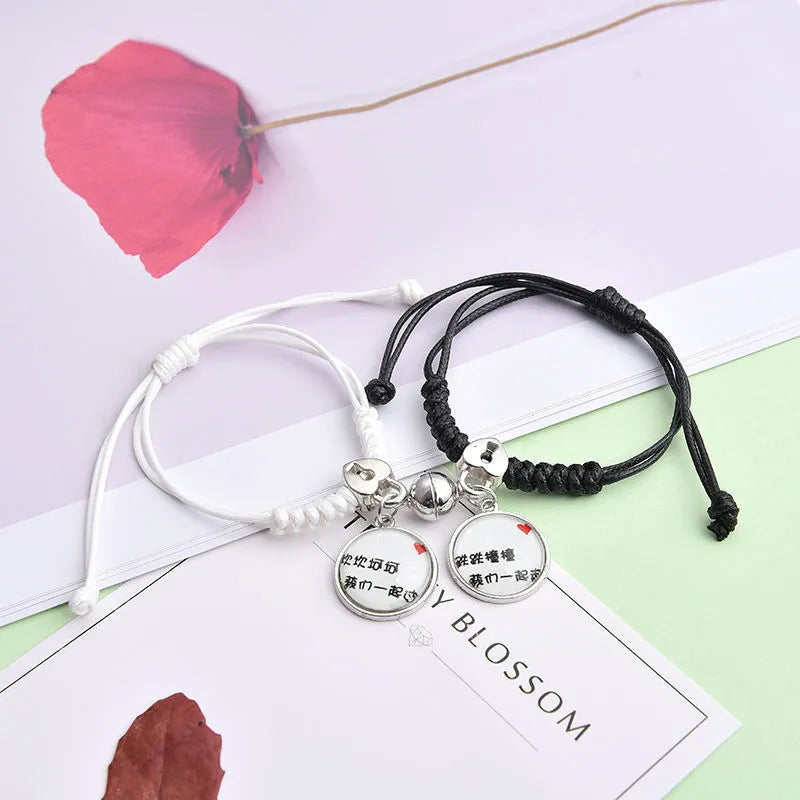 Magnetic couple bracelets with crown and diamond designs in alloy electroplated construction