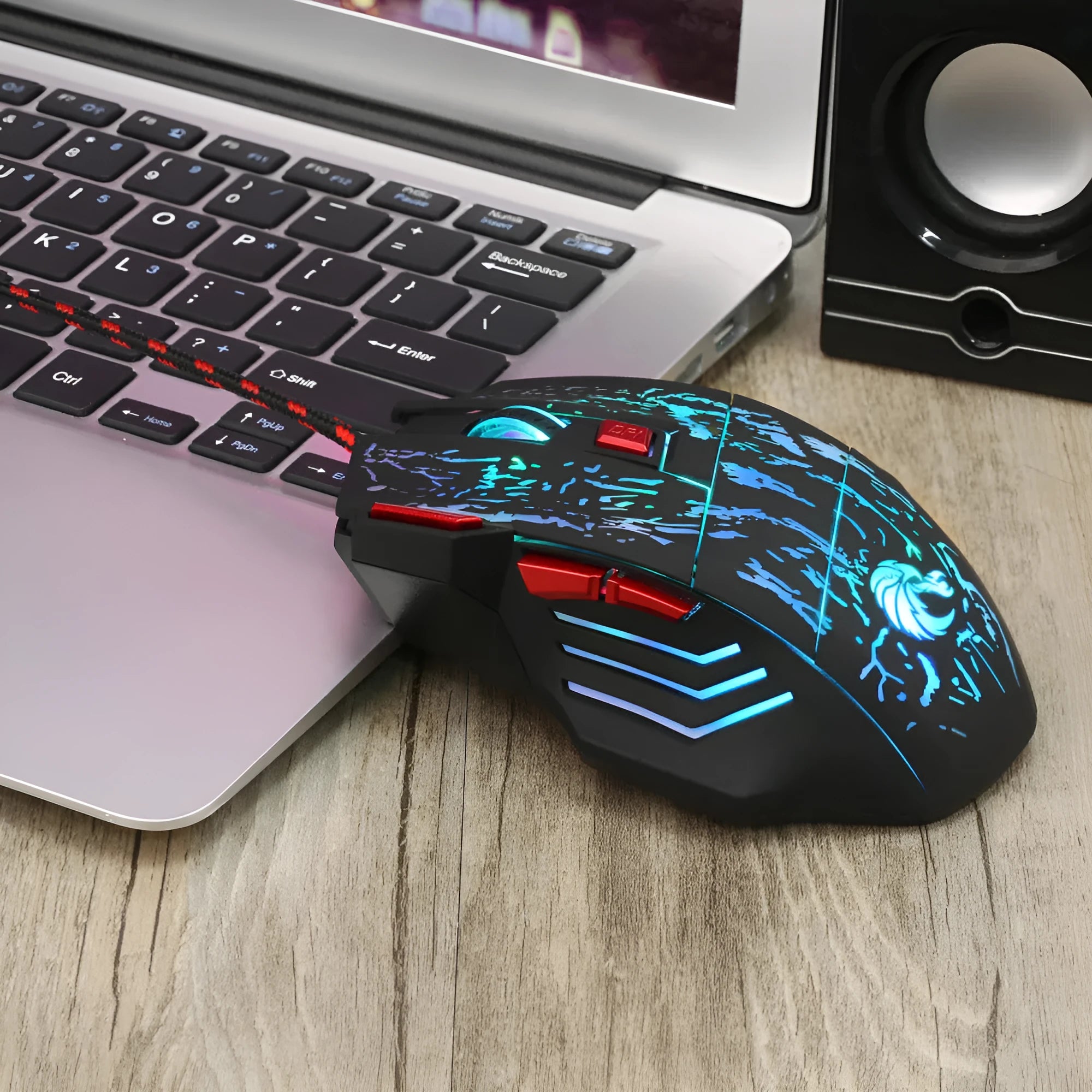 H300BK coloured wired gaming mouse with USB cable on desktop