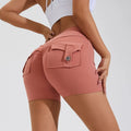 Women's high waist hip lifting sports shorts with side pockets in electric blue colour