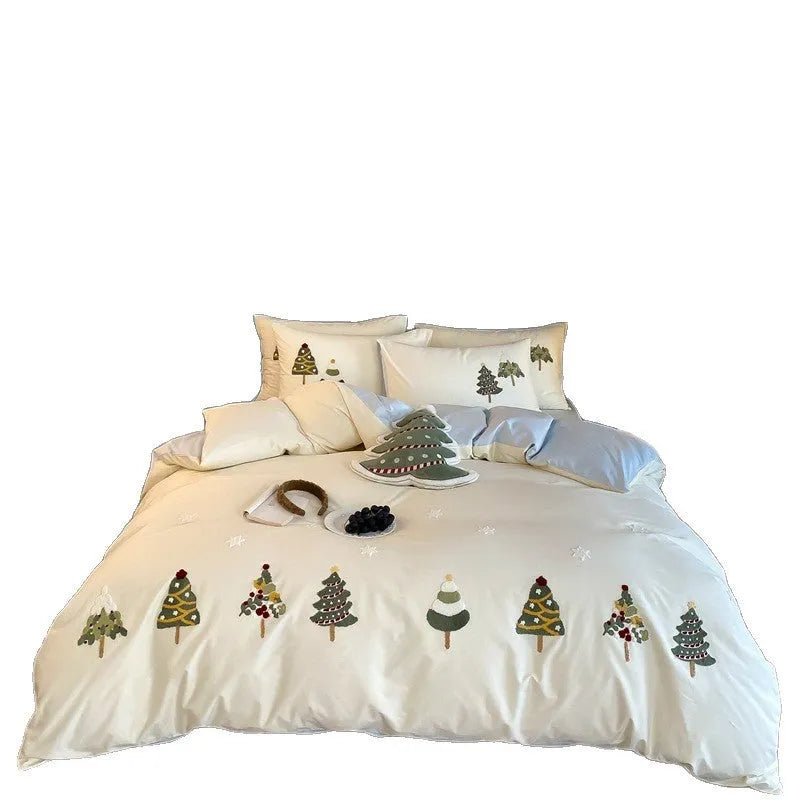 Pure cotton duvet cover set with embroidered Christmas trees and flowers, shown in cream blue colour.