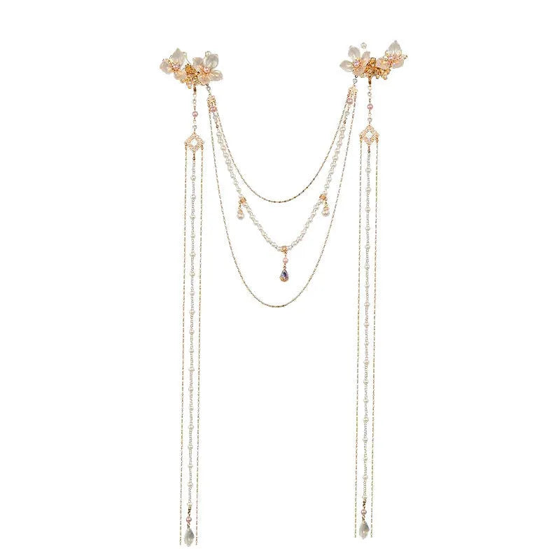 Gold women's hairpin with pearl, diamond and tassel decorative elements