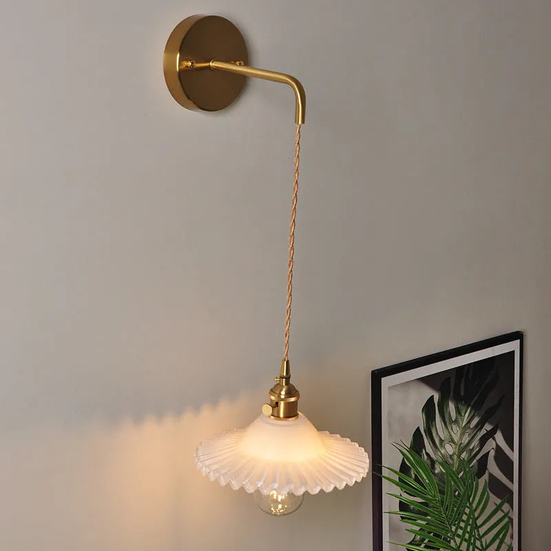 Brass lotus wall lamp with glass shade in six colour options