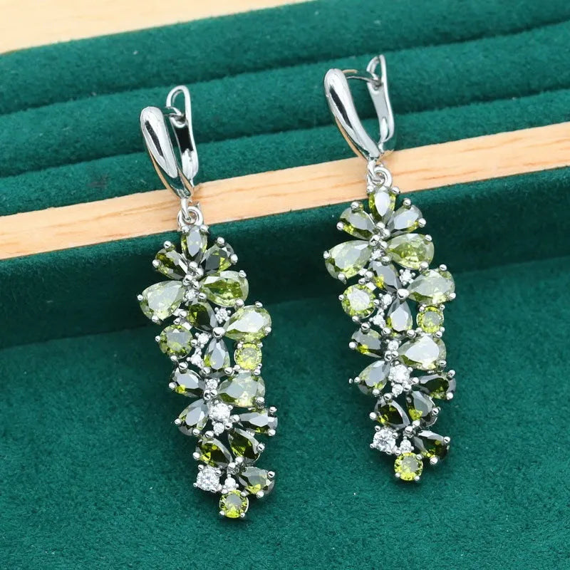 Retro botanical pattern jewellery set in copper alloy with zircon stones, showing necklace, bracelet, earrings, and ring.