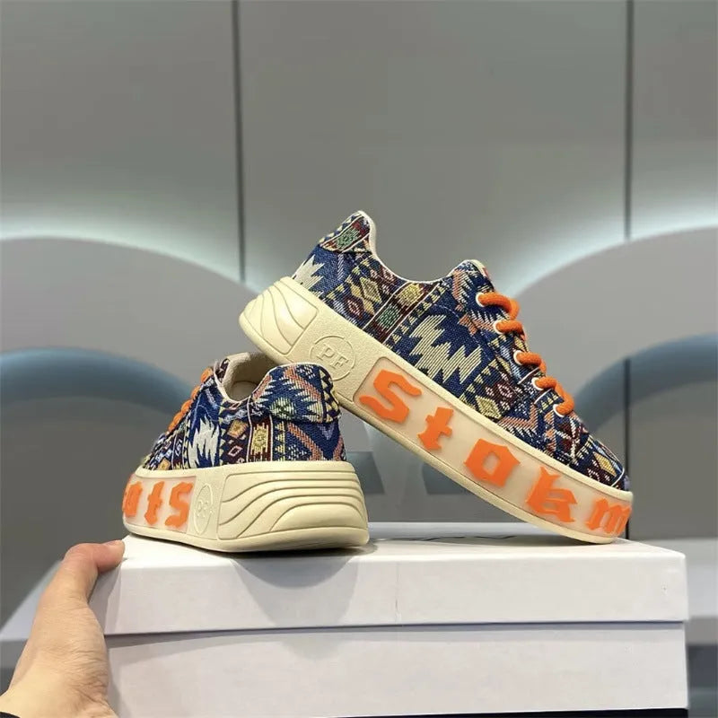 Men's low top printed board shoes in blue with cloth upper and rubber sole