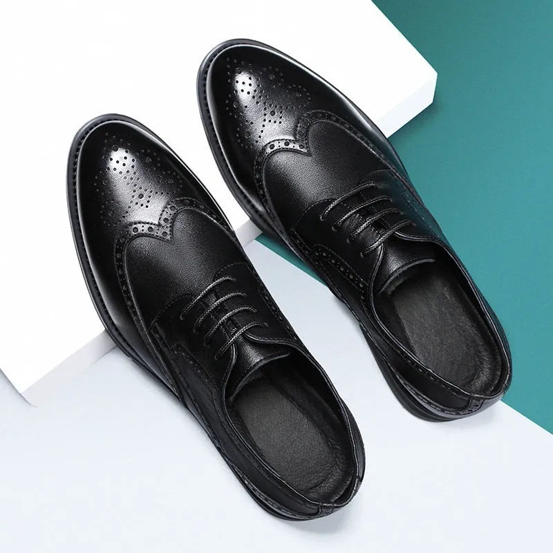 Men's black and brown brogue leather shoes in business style with traditional detailing