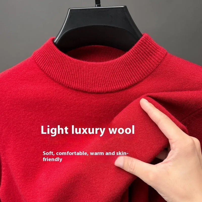 Men's solid colour fine yarn half-turtleneck long sleeve pullover on a hanger.