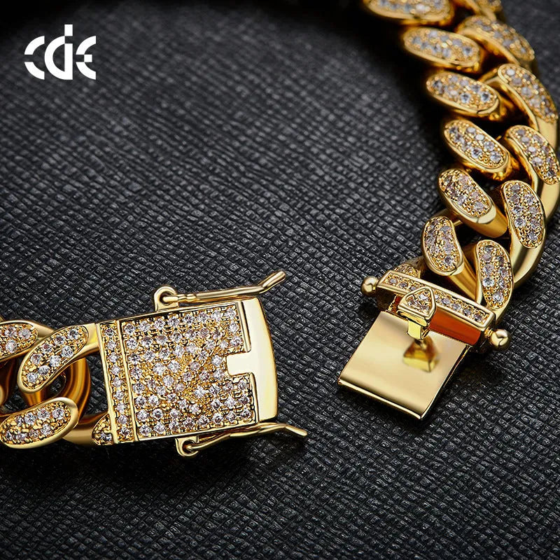 Gold men's Cuban chain bracelet with geometric zircon detailing on alloy frame