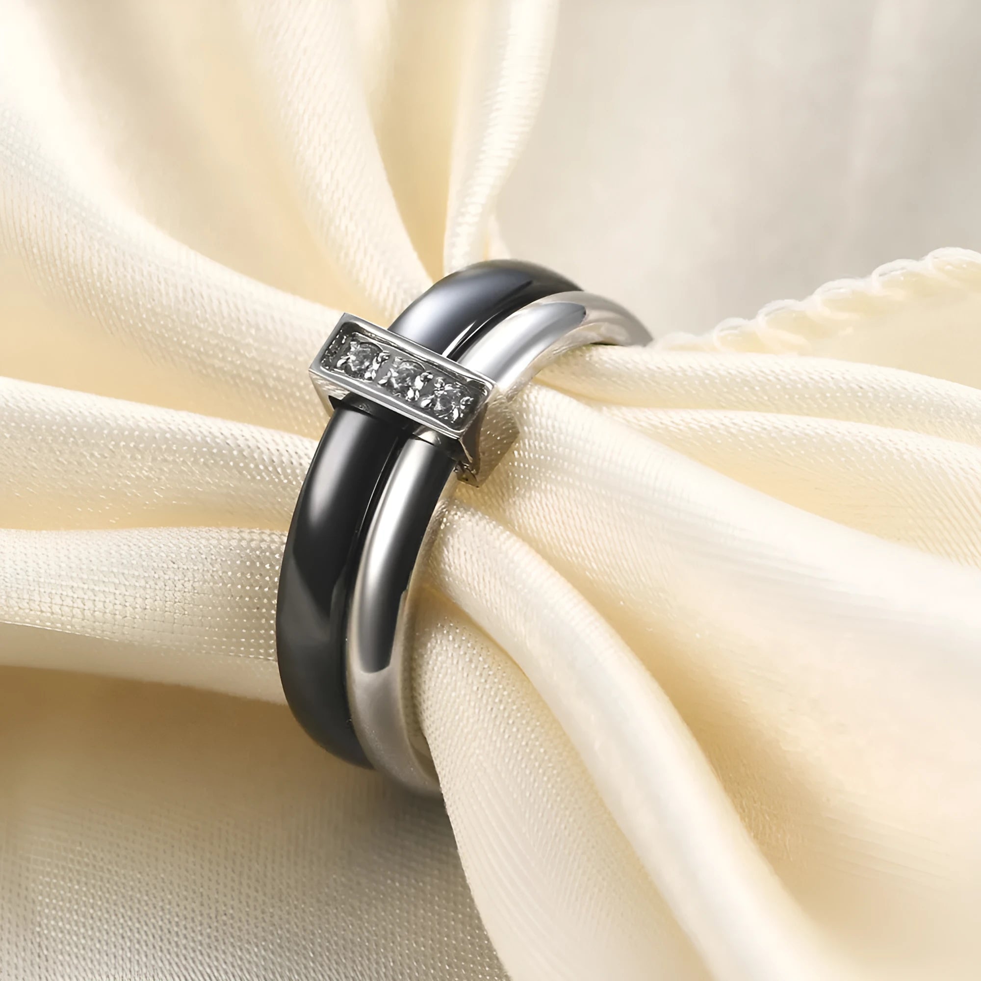 Ceramic geometric ring with glossy stitching inlaid zirconium in steel black colour