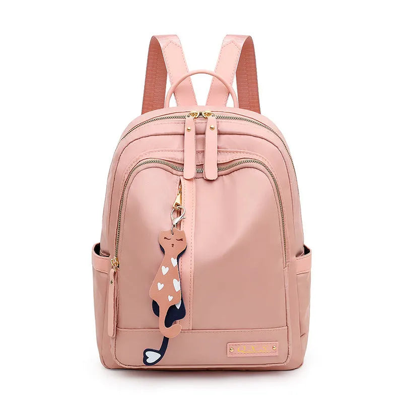 Black and pink casual nylon backpack with double straps, soft handle, and square vertical shape