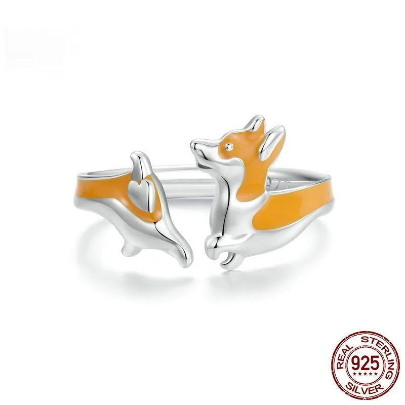 Silver ring with a raised cartoon corgi design in SCR1014-E electroplated colour.