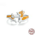 Silver ring with a raised cartoon corgi design in SCR1014-E electroplated colour.