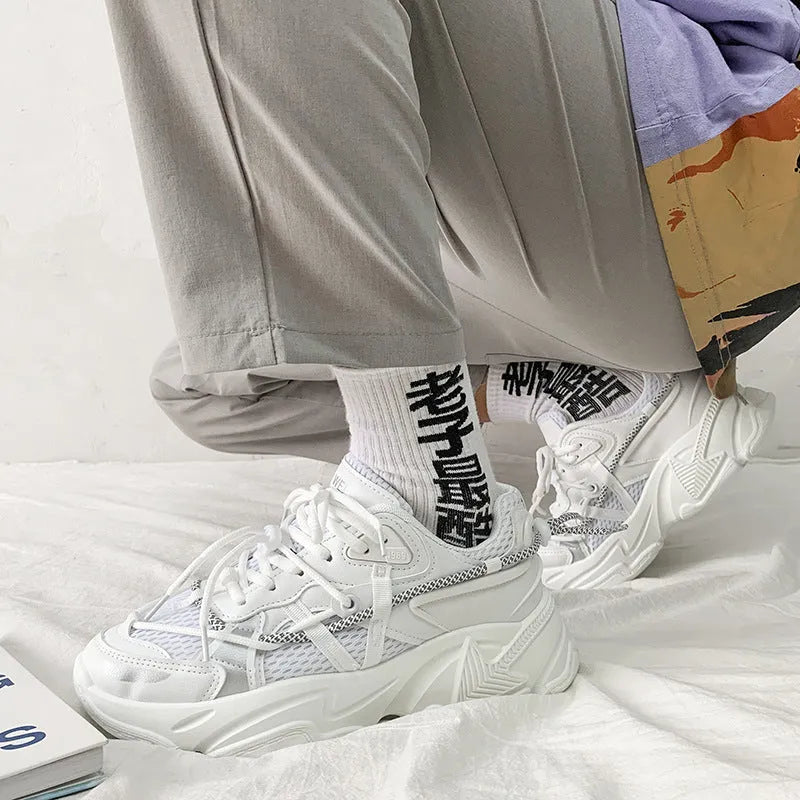 A pair of men's white Korean-style platform sports shoes with a lace-up front.