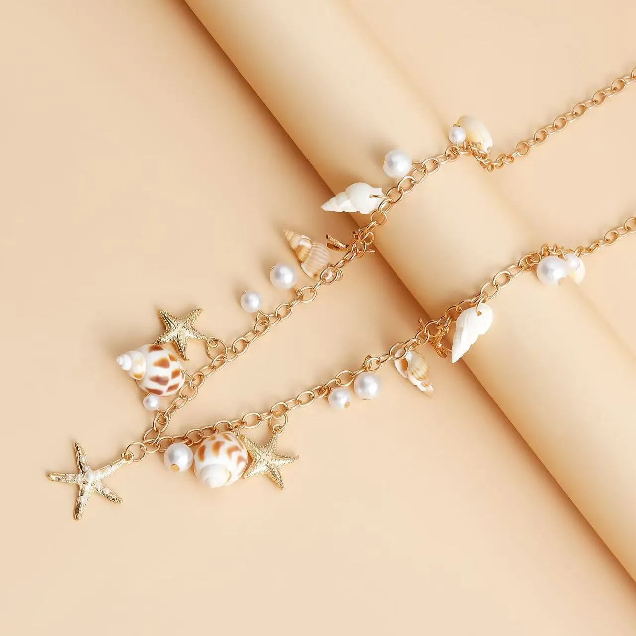 Women's alloy waist chain and bracelet set with star charms for beach and festival wear