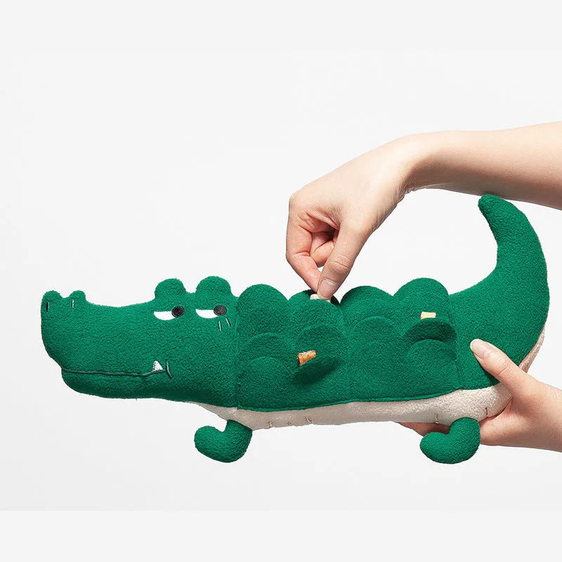 Green durable plush dog toy with squeaker, shown at 35 cm length for scale.