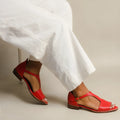 Red women's plus size square buckle sandals with herringbone toe holder, shown in a casual style.